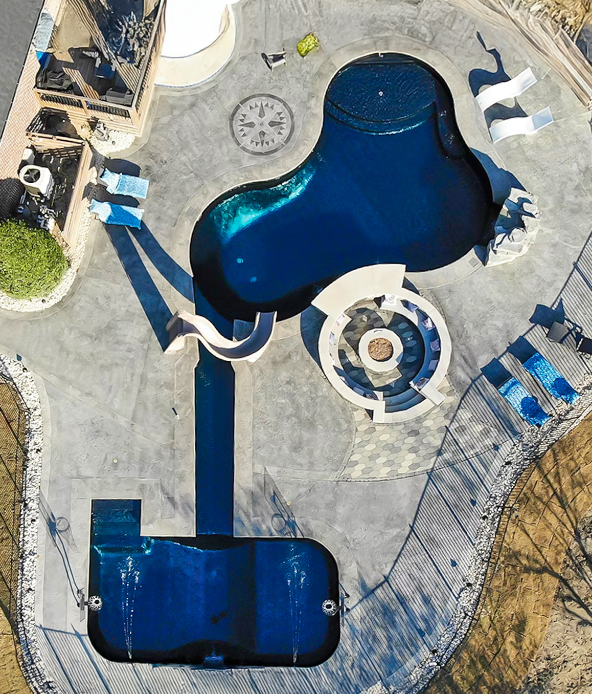 A basketball pool roughly 14-by-28 feet in size with 2-foot radius corners.