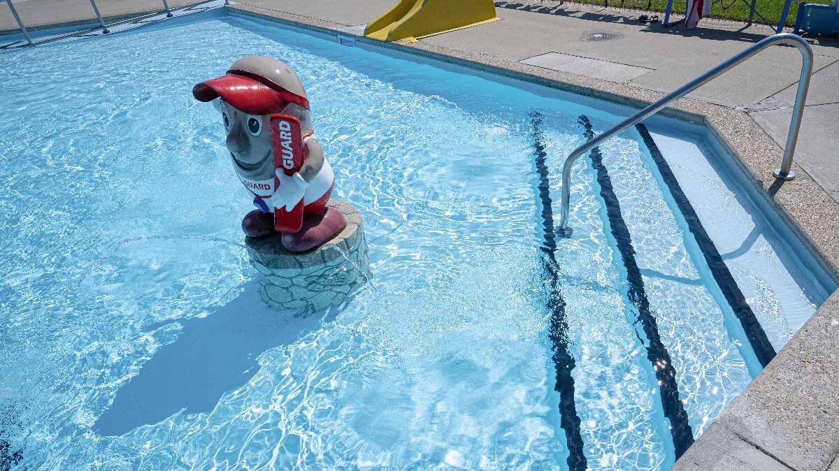 Bow island mascot MacBean in the pool