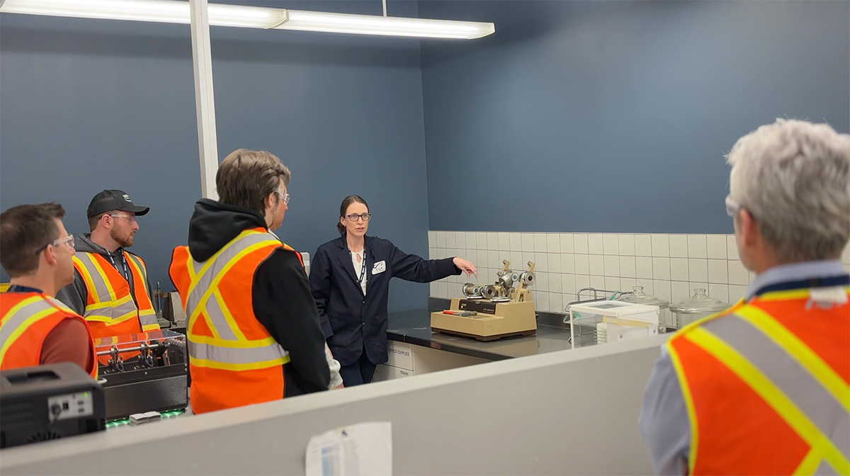 visitors in the quality control lab